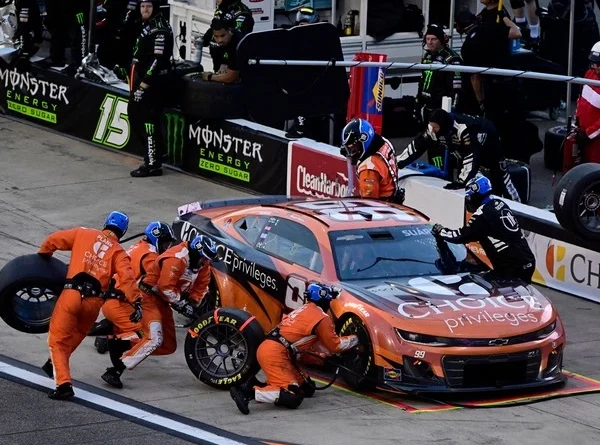 How does racing tire strategy change live odds?