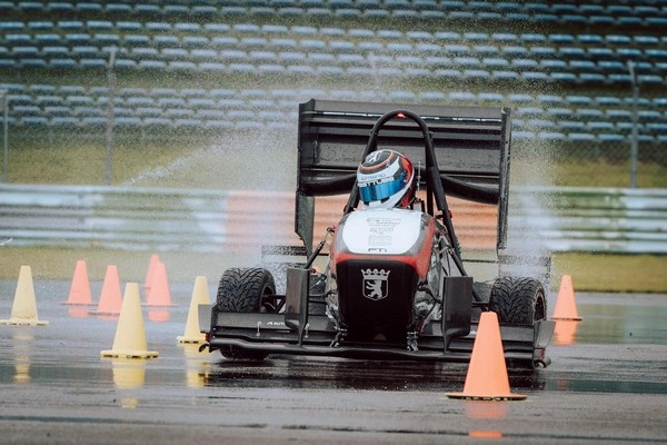 How does racing track temperature influence betting outcomes?