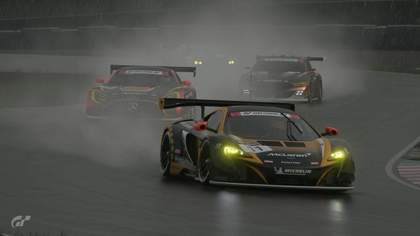 What makes racing wet track conditions unpredictable?